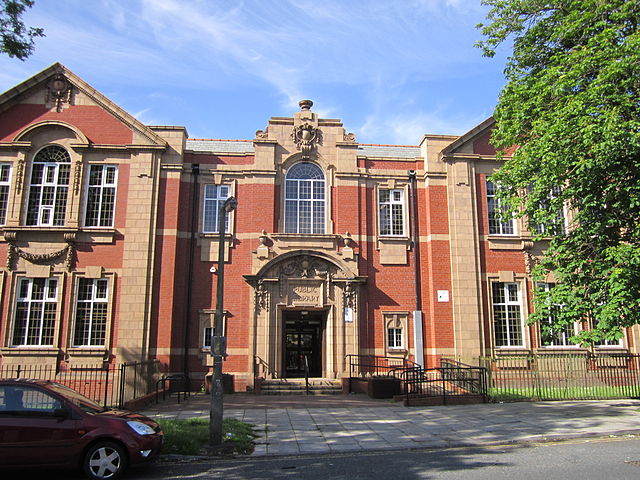 Red brick building with large windows